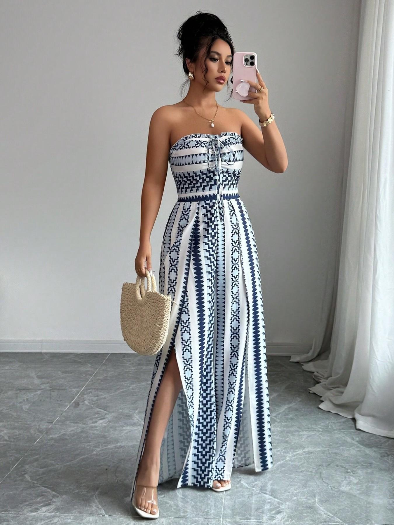 👗 50% OFF NOW! 💥 Geometric Jumpsuit with Halter Neckline & Side Slit – Unique print & elastic back – Versatile. perfect for summer parties or resort wear ✨