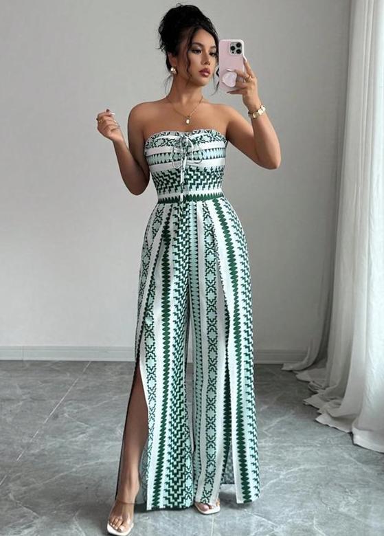 👗 50% OFF NOW! 💥 Geometric Jumpsuit with Halter Neckline & Side Slit – Unique print & elastic back – Versatile. perfect for summer parties or resort wear ✨
